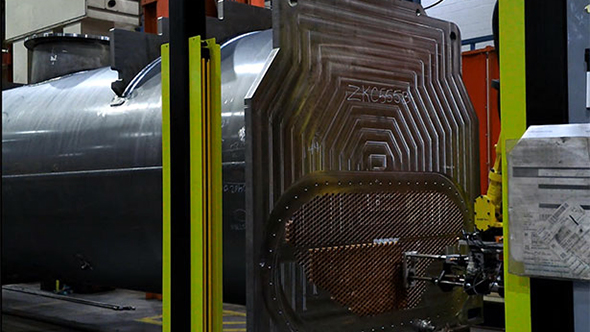 Robotmaster utilisé pour programmer le système de laminage de tubes robotisé